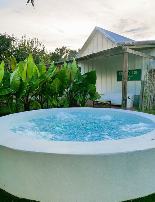 the frenchie boutique hotel hot tub in round top texas